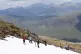 Skiers and snowboarders climb up to the remaining snow patches on Meall a'Bhuiridh in Glencoe to take part in the Midsummer Ski. The event, organised by the Glencoe Mountain Resort, is held every year on the weekend closest to the Summer Solstice, June 20, 2021