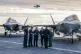 Prime Minister Keir Starmer (third left) and Defence Secretary John Healy (third right) talk with naval officers on the flight deck of HMS Prince of Wales, the Royal Navy's flagship aircraft carrier, in Plymouth, Devon, April 24, 2025