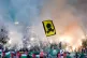 Celtic fans hold flares and flags, before the William Hill Premiership match at Celtic Park, Glasgow, May 17, 2025