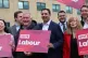 Davy Russell (centre left) and Scottish Labour leader Anas Sarwar celebrate during a rally on Castle Street, Hamilton
