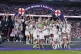 England players celebrate with the trophy, July 31, 2022