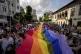 People hold a rainbow flag banner during the gay pride parade in Bucharest, Romania, June 7, 2025