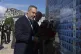 Turkish Foreign Minister Hakan Fidan (front) and Ukraine's Foreign Minister Andrii Sybiha (behind) lay flowers at the memorial wall of the fallen soldiers in Kyiv, Ukraine, May 30, 2025