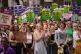 Women's rights campaigners in Westminster, London after taking part in a march from the Royal Courts of Justice calling for decriminalisation of abortion, June 17, 2023