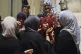 Palestinians women mourn during the funeral of people who were killed while returning from one of the Gaza Humanitarian Foundation distribution centers operated by the U.S.-backed organization, according to Nasser Hospital, during their funerals in Khan Younis, Monday, June 30, 2025