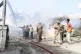 Rescue efforts take place at the site after an African Union military helicopter crashed at Aden Adde airport in Mogadishu, Somalia, July 2, 2025