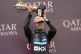 McLaren driver Lando Norris of Britain holds the trophy as he celebrates winning the British Formula One Grand Prix race at the Silverstone racetrack in Silverstone, England, July 6, 2025