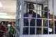 Ugandan opposition leader and four-time presidential candidate Kizza Besigye, stands in the dock at the Makindye Martial Court in Kampala, Uganda, November 20, 2024