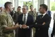 British Prime Minister Keir Starmer (centre) and French President Emmanuel Macron (right) look at screens during a joint military visit to the MARCOM centre, maritime command centre in Northwood, London, July 10, 2025