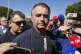 Brazil's former President Jair Bolsonaro speaks to the press outside the Secretariat of Penitentiary Administration where he arrived after the Supreme Court ordered him to be fitted with an electronic ankle monitor in Brasilia, Brazil, July 18, 205