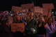 People chant while holding banners during a protest against a law targeting anti-corruption institutions in central Kyiv, Ukraine, July 22, 2025
