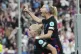 England's Chloe Kelly, up, celebrates on the back of England's Alex Greenwood after England scored their first goal during the Women's Euro 2025 semifinals soccer match between England and Italy at Stade de Geneve in Geneva, Switzerland, Tuesday, July 22, 2025