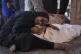 Khaleda El-Feki embraces the body of her husband, Mohamed El-Maghribi, who was killed by an Israeli air strike, at al-Aqsa Hospital in Deir al-Balah, central Gaza Strip, July 24, 2025