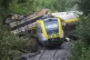 Wagons of a derailed regional passenger train lie on a railroad line near Riedlingen, Germany, July 28, 2025