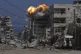 Smoke and flames erupt from an Israeli airstrike in Gaza City, July 21, 2025