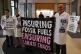 Scientists occupy the lobby of the Prudential Regulation Authority (PRA), part of the Bank of England, July 23, 2025