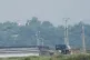 A North Korean military guard post, loudspeaker, (top left) and South Korean army soldiers (bottom right) are seen from Paju, South Korea, near the border with North Korea, on June 12, 2025