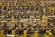 Workers pack orders on the warehouse floor at the Amazon UK Fulfilment Centre in Peterborough, Cambridgeshire