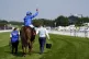 Jockey William Buick celebrates on board Notable Speech after winning the Sussex Stakes during day two of the Goodwood Festival, Chichester, July 31, 2024
