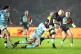 Harlequins' Tom Lawday (centre) is tackled by Glasgow Warriors' Gregor Brown during the Investec Champions Cup match at the Twickenham Stoop Stadium, London, January 18, 2025