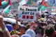 Crowds watch Kneecap performing on the West Holts Stage during the Glastonbury Festival at Worthy Farm in Somerset. Picture date: Saturday June 28, 2025