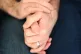 A couple holding hands