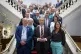 Reform UK leader Nigel Farage is accompanied by councillor Brian Collins (left) and the Head of Kent County Council, Linden Kemkaran (right) as he poses for a photo with members of Kent County Council, County Hall, Maidstone, July 7, 2025
