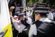 Police officers remove a person after they took part in a protest in Parliament Square, London, to call for de-proscription of Palestine Action, July 12, 2025