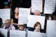 People take part in a protest in Parliament Square, London, to call for de-proscription of Palestine Action after a ban against the organisation, July 12, 2025