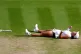Iga Swiatek celebrates victory over Amanda Anisimova following the Ladies' Singles Final on day thirteen of the 2025 Wimbledon Championships at the All England Lawn Tennis and Croquet Club, London, July 12, 2025