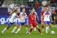 Wales' Jess Fishlock (centre) battles for the ball with England players during the UEFA Women's Euro 2025 Group D match at the Arena St. Gallen in St. Gallen, Switzerland, July 13, 2025