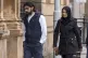 Attiya Sheikh (right) and her husband Omer Sheikh arrive at Paisley Sheriff Court for sentencing after pleading guilty in May to resetting PPE during the pandemic and selling it on eBay, July 18, 2025