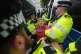 Metropolitan Police officers remove a person at a protest in Parliament Square, central London, in support of Palestine Action, organised by Defend Our Juries who are campaigning to de-proscribe the organisation, July 19, 2025