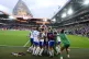 England players celebrate with Chloe Kelly after she scored the winning penalty in the shoot-out during the UEFA Women's Euro 2025 final at St Jakob-Park in Basel, Switzerland, July 27, 2025