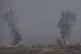 Smoke from an explosion rises in the northern Gaza Strip, as seen from southern Israel, July 18, 2025