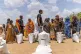 This June 2023 photo provided by the World Food Programme shows food distribution by the WFP for internally displaced persons at the Wad Almajzoub farm camp in Wad Medani, Gezira state, Sudan