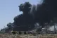 Smoke billows after drone strikes by the paramilitary Rapid Support Forces (RSF) targeted the northern port in the Red Sea city of Port Sudan, May 6, 2025