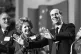 Margaret Thatcher with Norman Tebbit appeals to delegates to stop the applause after his speech at the opening of the annual Tory conference at the Winter Gardens, Blackpool, October 8, 1985