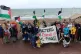 Walkers gather in the rain in St Leonards for the Fundraising walk,  July 20, 2025 Pic: Hastings Friends of Al-Mawasi