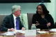 Chairman Jerome Powell, left, talks with board of governors member Lisa Cook