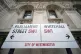 A street sign giving directions to Parliament Street and Whitehall in London