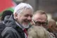 WikiLeaks founder Julian Assange prepares to march with protesters across the Sydney Harbour Bridge during the Palestine Action Group's March for Humanity in Sydney, August 3, 2025