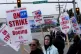 Boeing workers wave picket signs as they strike after union members voted to reject a contract offer near the company's factory in Everett, Washington, September 15, 2024