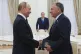 Russian President Vladimir Putin (left) and U.S. President Donald Trump's special envoy Steve Witkoff (right) shake hands during their meeting in Moscow, Russia, August 6, 2025