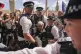 Police officers arrest a demonstrator during a protest in support of the Palestinian People in Gaza, in Parliament Square, in London, Saturday, Aug. 9, 2025