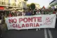 People hold a banner during a demonstration against the bridge in Messina, Italy, August 9, 2025