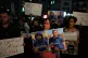 Protesters chant anti Israel slogans and carry posters with pictures of Palestinian journalists Anas al-Sharif and Mohamed Qreiqeh that Israel's military targeted and killed with an airstrike late Sunday in Gaza, during a protest in the West Bank city of Ramallah