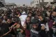 Palestinians carry the body of Al Jazeera correspondent Anas al-Sharif at his funeral outside Gaza City's Shifa hospital complex, August 11, 2025