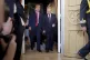 President Donald Trump, left, and Russian President Vladimir Putin, right, arrive for a one-on-one-meeting at the Presidential Palace in Helsinki, Finland, July 16, 2018