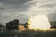 In this photo taken and distributed by Russian Defense Ministry Press Service on Friday, Aug. 15, 2025, a Russian tank fires during a practice at a training ground during on an undisclosed location in Ukraine